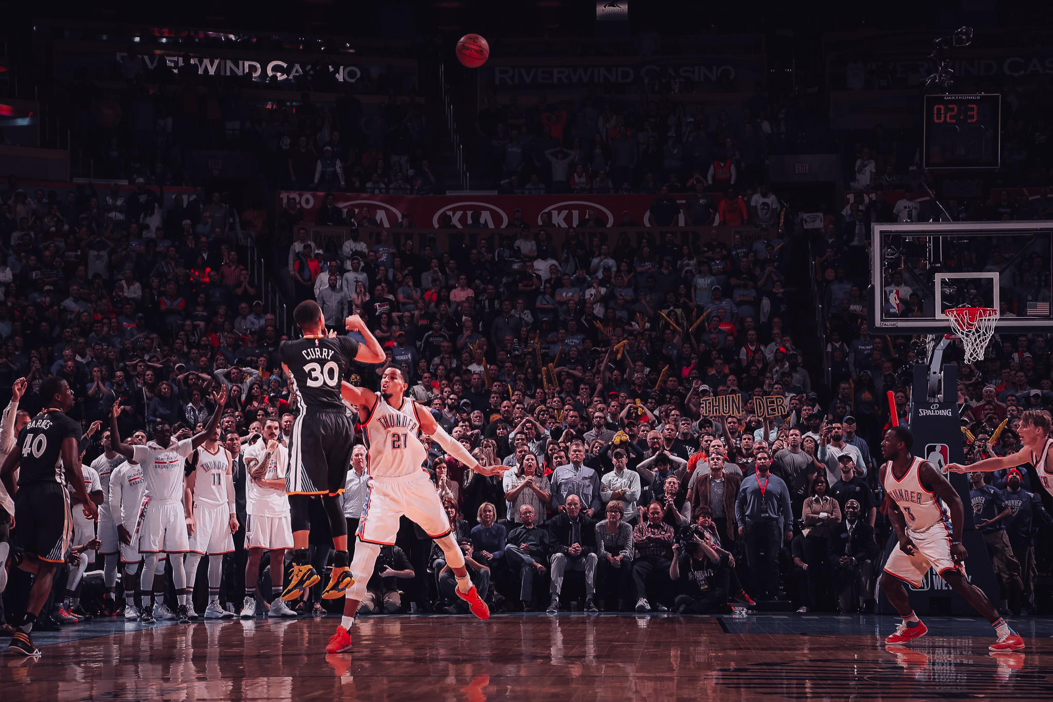 Steph Curry releasing his 38-foot game-winning three-pointer over Oklahoma City defender Russell Westbrook on February 27, 2016, with 0.2 seconds on the clock.